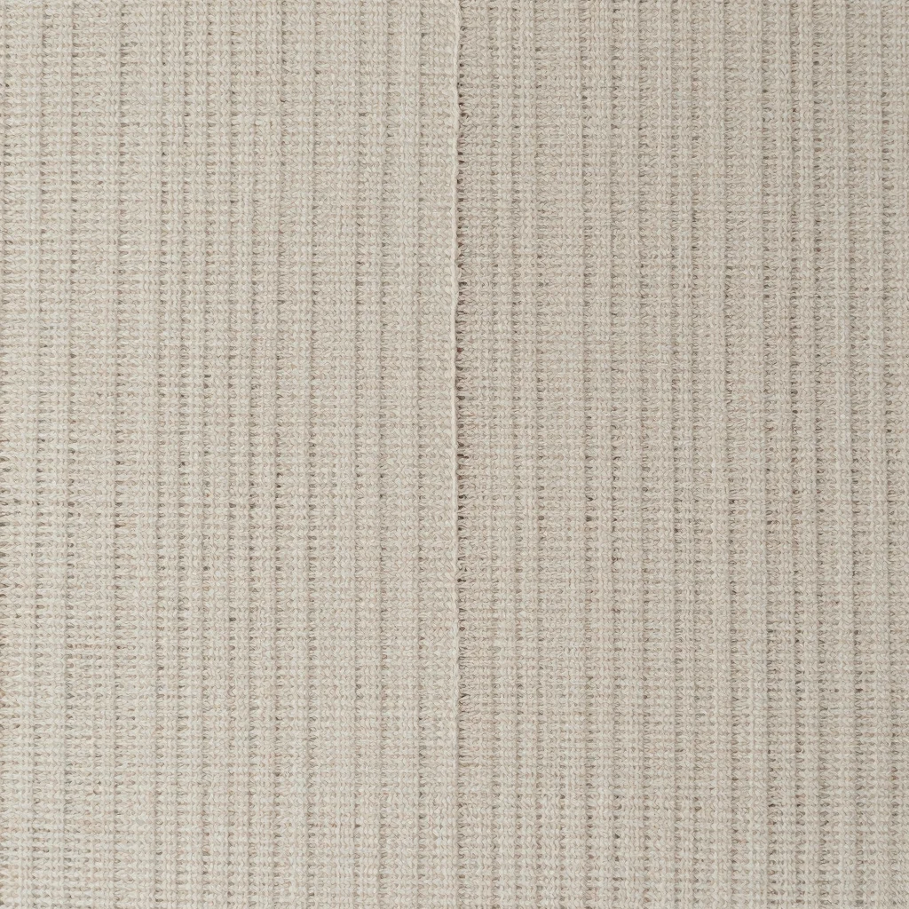 Editorial artwork photograph of a hand-woven textile panel, soft